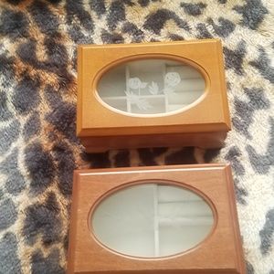 Two wooden jewelry boxes designed differently